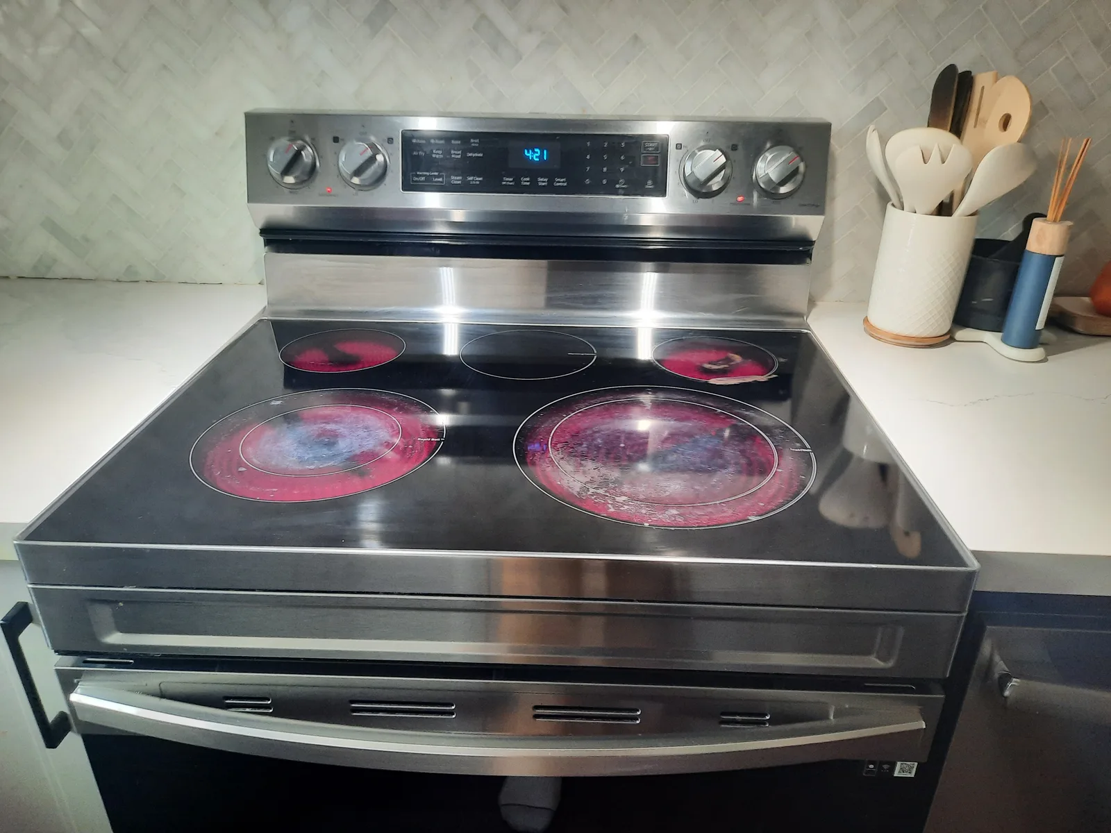 Electric range operating during a home inspection