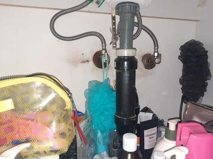 Accessible sink supply and drainage components reviewed during an inspection